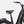 Laden Sie das Bild in den Galerie-Viewer, Specialized E-Bike Como 4.0 mit Kettenschaltung RH in schwarz, Detailansicht schräg von Hinten vor weißem Hintergrund