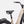 Laden Sie das Bild in den Galerie-Viewer, Specialized E-Bike Como 4.0 mit Kettenschaltung RH in beige mit schwarzen Details, Detailansicht schräg von Hinten vor weißem Hintergrund