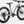 Laden Sie das Bild in den Galerie-Viewer, Specialized Kinder Mountainbike in glänzendem weiß mit dunkelgrünen Details, 20 Zoll und ideal für 4- bis 9-Jährige, Mountainbike, schräge Ansicht von Vorne auf weißem Hintergrund