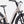 Laden Sie das Bild in den Galerie-Viewer, E-Bike in hellbeige, schräge Ansicht von Vorne vor weißem Hintergrund, leicht angeschnitten
