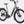 Laden Sie das Bild in den Galerie-Viewer, E-Bike in hellbeige, schräge Ansicht von Vorne vor weißem Hintergrund
