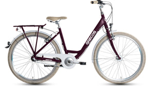 Grecos Kinderfahrrad in mattem Violett mit creme-weißer Ausstattung, Gepäckträger, Licht und Kettenschutz, 26 Zoll und ideal für 10- bis 14-Jährige, seitliche Ansicht vor weißem Hintergrund.